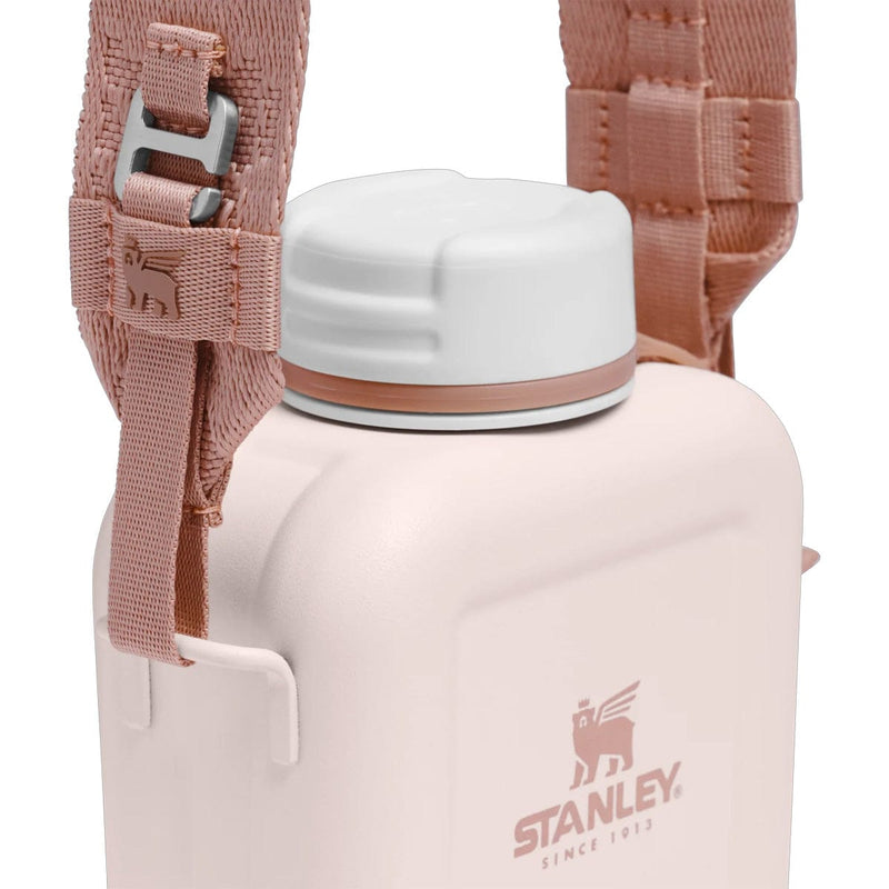 Load image into Gallery viewer, Pink water bottle with white cap and Stanley logo on a white background
