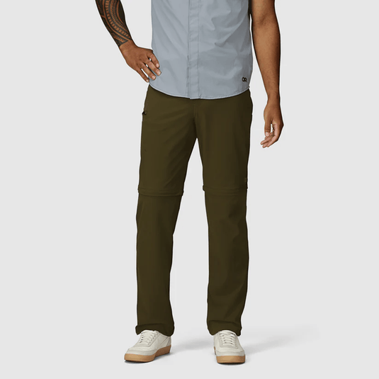 Person wearing olive green pants on a white background
