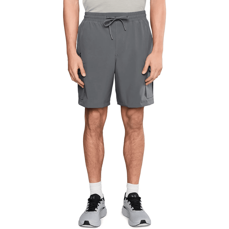 Load image into Gallery viewer, Person wearing gray athletic shorts on a white background

