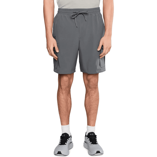 Person wearing gray athletic shorts on a white background
