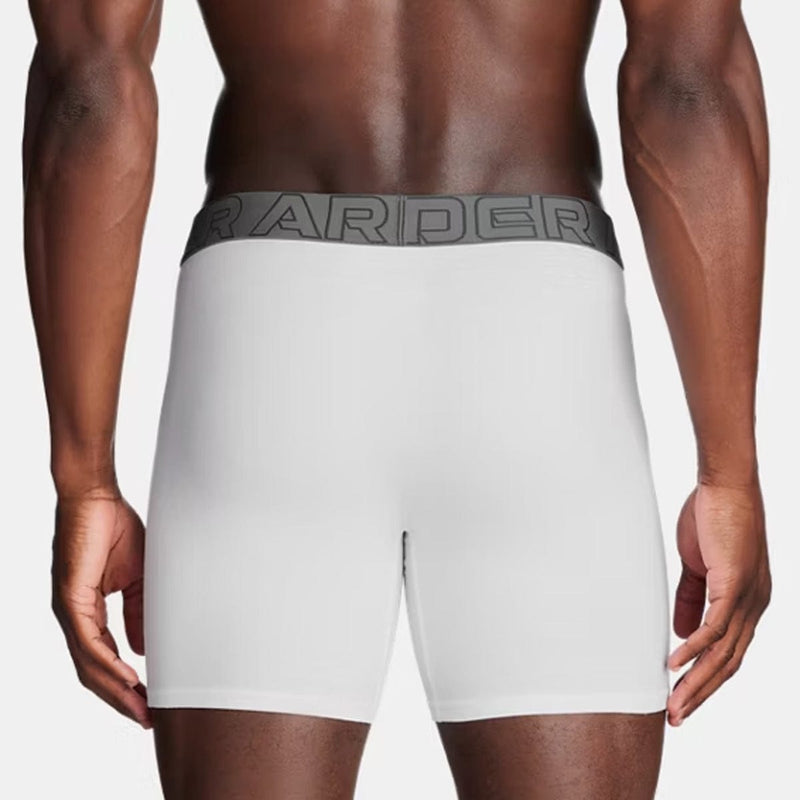 Load image into Gallery viewer, White boxer briefs with a gray brand waistband on a plain background
