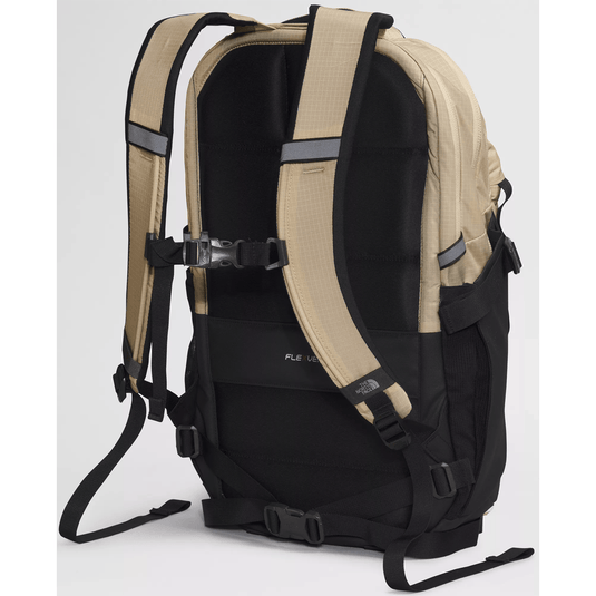 Black and beige backpack on a white background