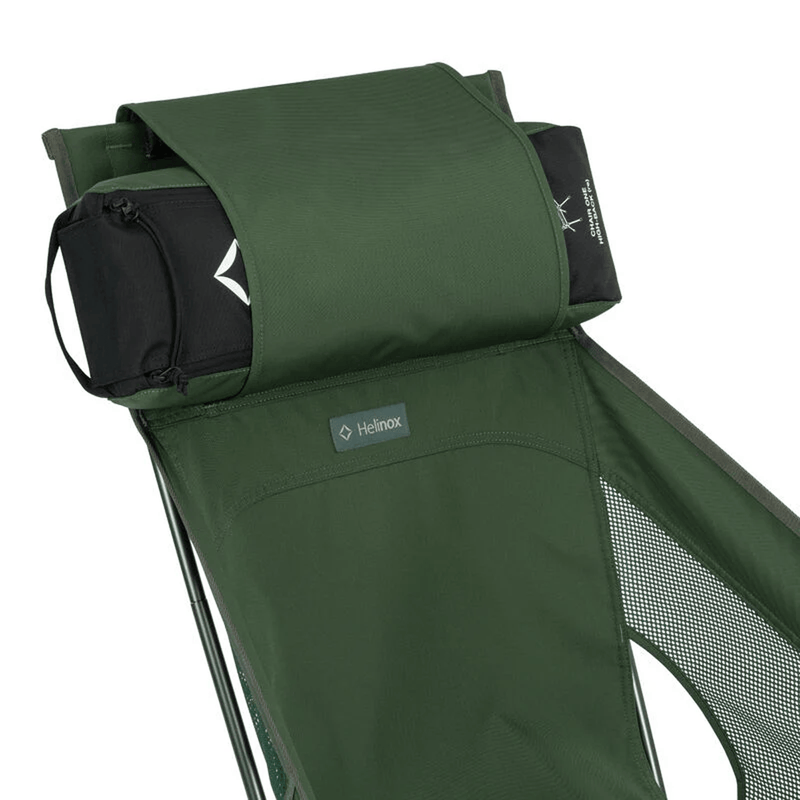 Load image into Gallery viewer, Green camping chair with a headrest, featuring Helinox logo, on a light gray background
