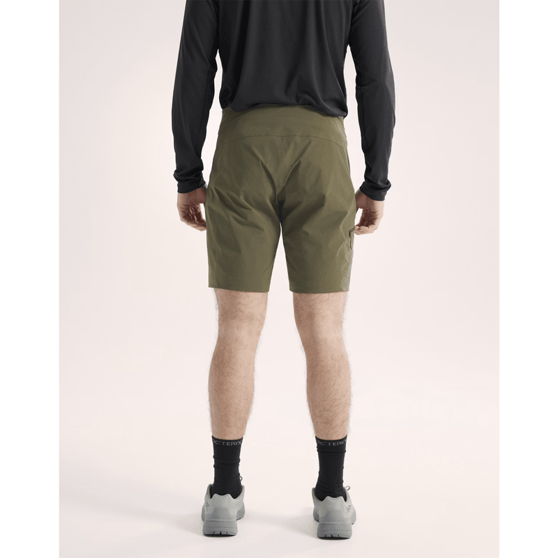 Load image into Gallery viewer, Person wearing olive green shorts on a plain background
