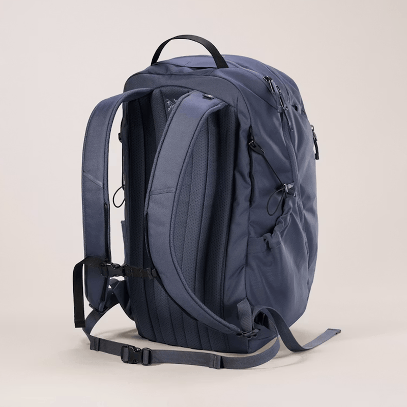 Load image into Gallery viewer, Blue backpack on a light beige background
