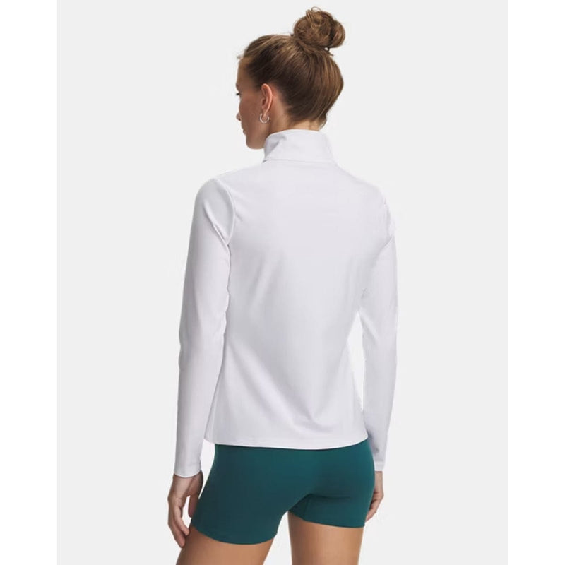 Load image into Gallery viewer, Woman wearing a white long-sleeve top and teal shorts on a white background
