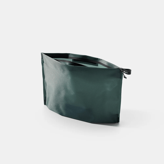 Green mesh bag with zipper on a white background