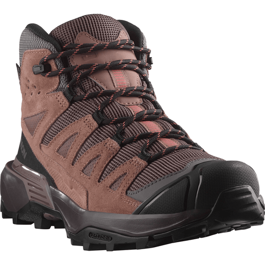 Brown hiking boot with black laces on a white background