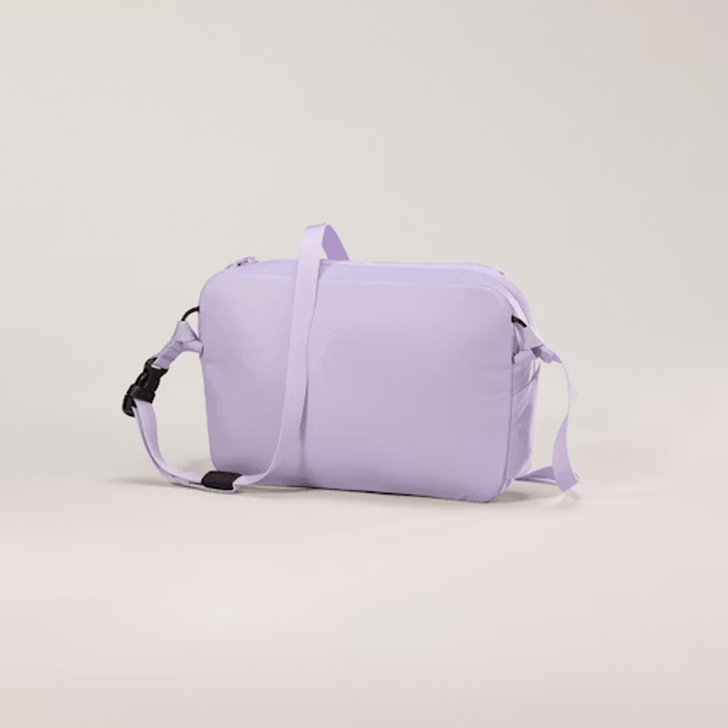 Load image into Gallery viewer, Purple bag with a strap on a light gray background
