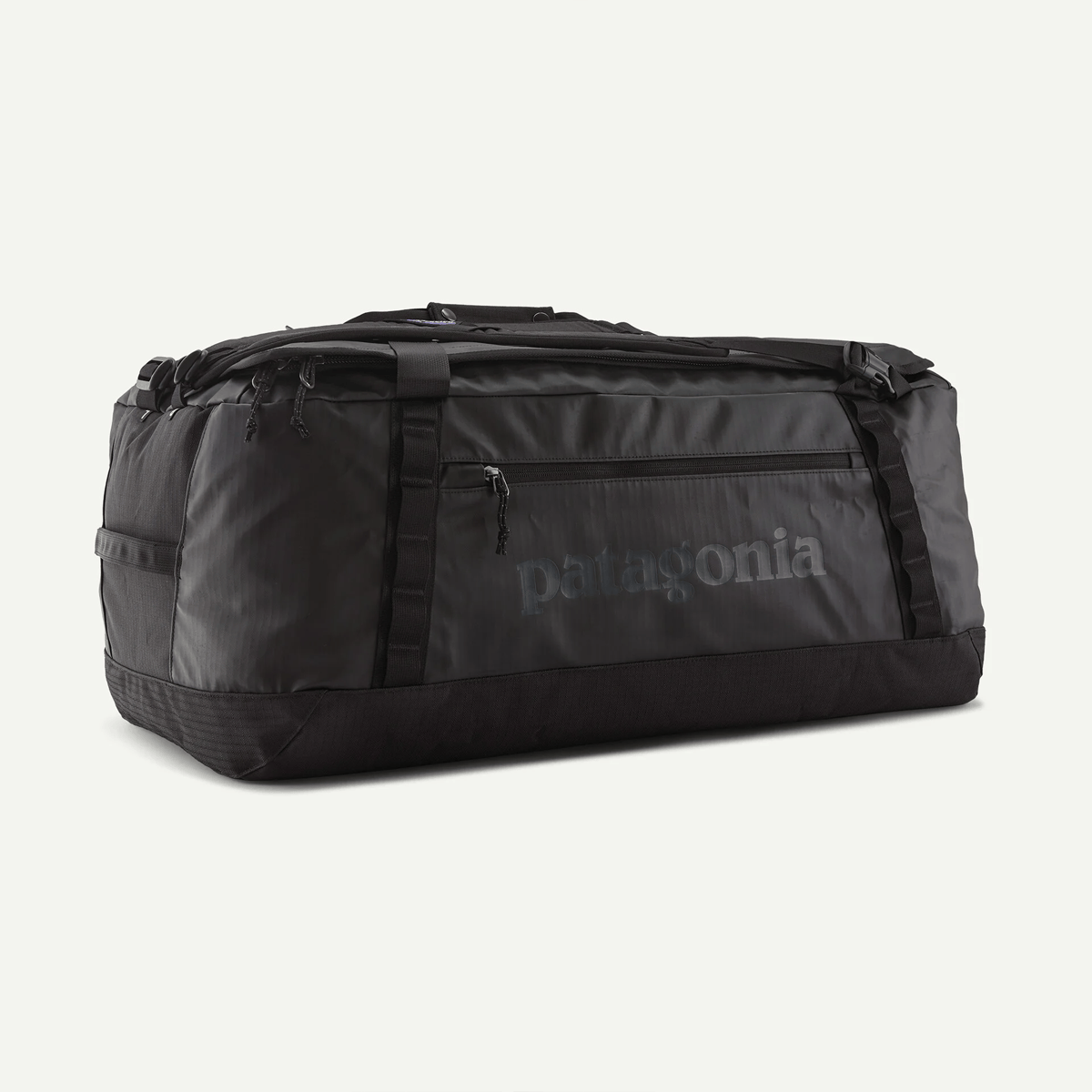 Black duffel bag with Patagonia logo on a light gray background