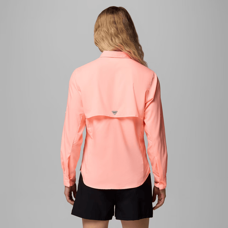 Load image into Gallery viewer, Person wearing a peach long-sleeve shirt and black shorts on a gray background
