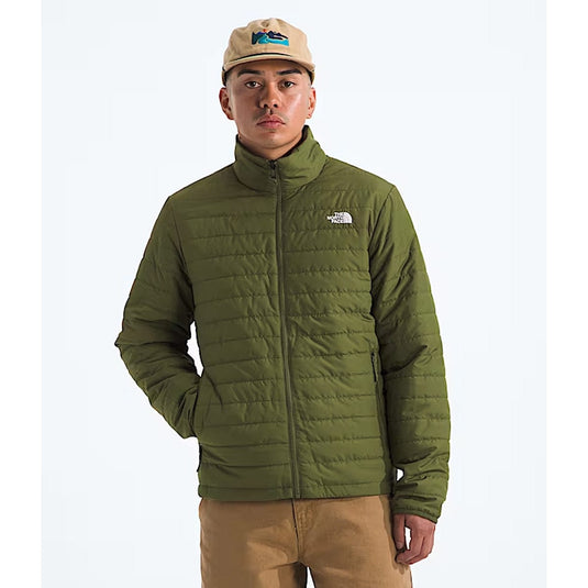 Man wearing a green jacket and beige cap with The North Face logo on a white background
