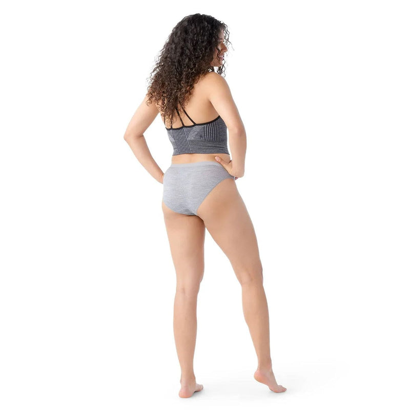 Load image into Gallery viewer, Woman wearing a gray bikini set on a white background

