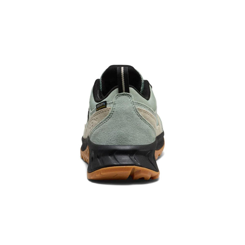 Load image into Gallery viewer, Green and black sneaker with brown sole on a white background
