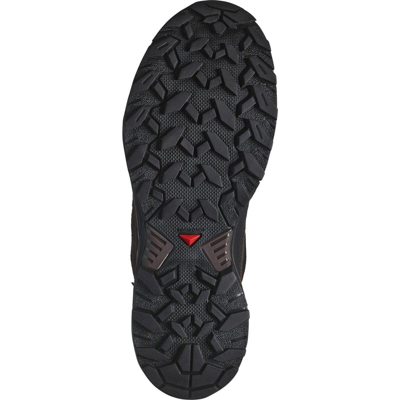 Load image into Gallery viewer, Close-up of a black hiking boot sole with a red logo on a white background

