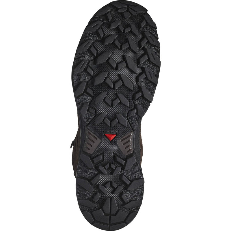 Load image into Gallery viewer, Close-up of a black hiking boot sole with a red logo on a white background

