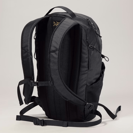 Black backpack on a light gray background