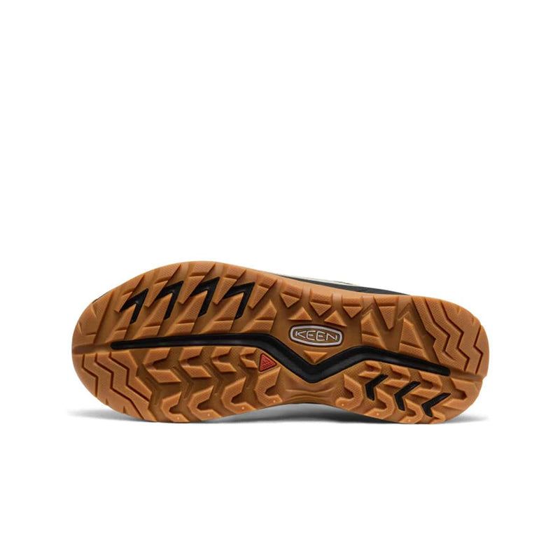 Load image into Gallery viewer, Close-up of a brown shoe sole with tread pattern on a white background

