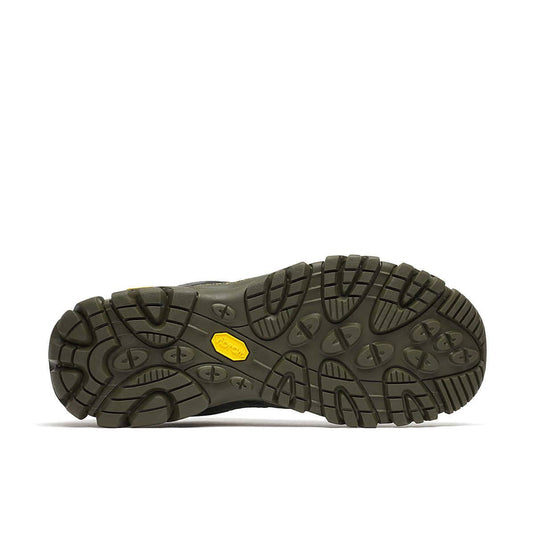 Black shoe sole with a yellow label on a white background