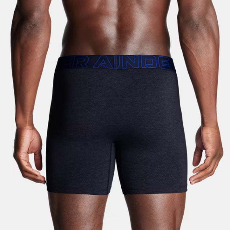Load image into Gallery viewer, Navy boxer briefs with a blue waistband on a plain background
