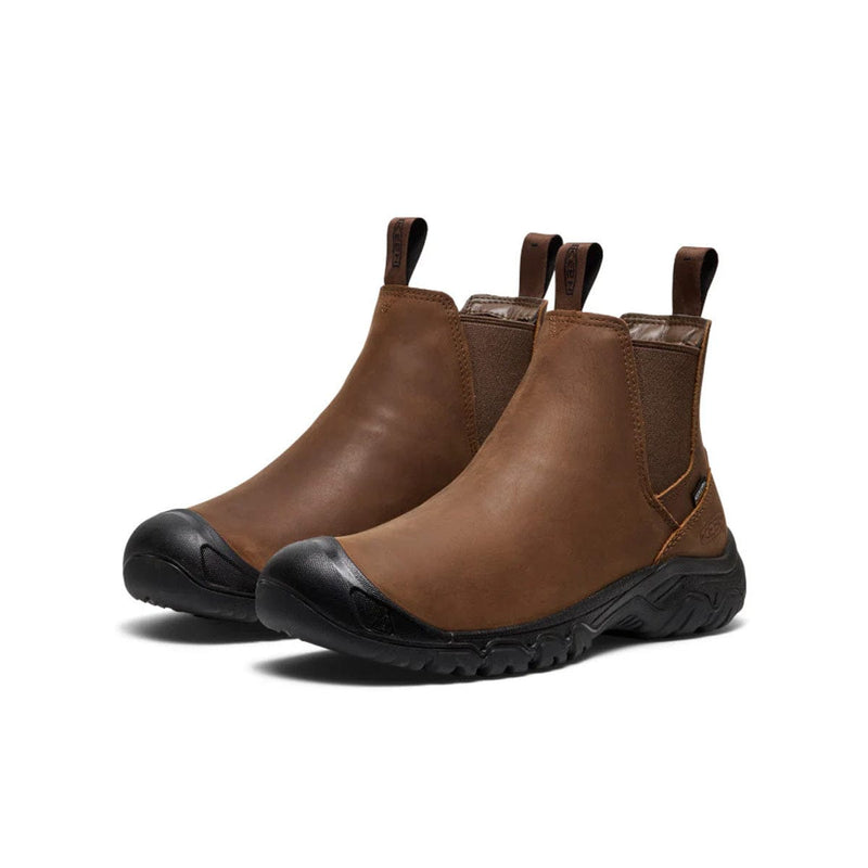 Load image into Gallery viewer, Pair of brown leather boots with black soles on a white background

