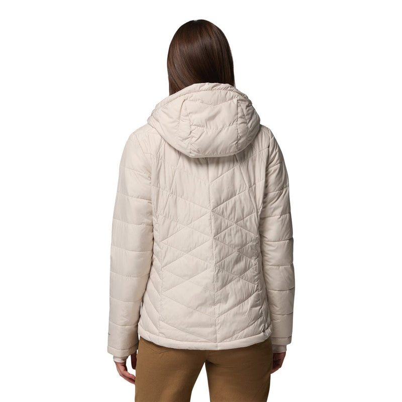 Load image into Gallery viewer, Person wearing a beige quilted jacket on a white background
