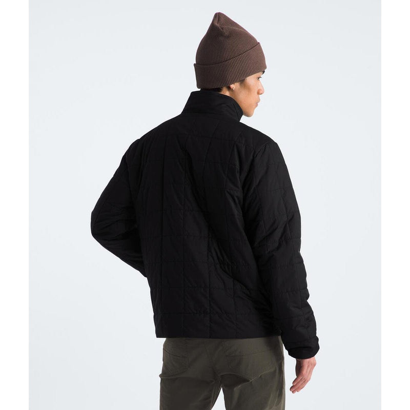 Load image into Gallery viewer, Person wearing a black jacket and brown beanie on a white background
