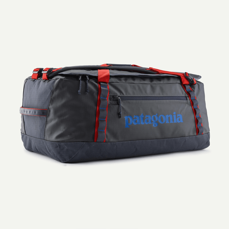 Load image into Gallery viewer, Gray duffel bag with red accents and Patagonia logo on a white background
