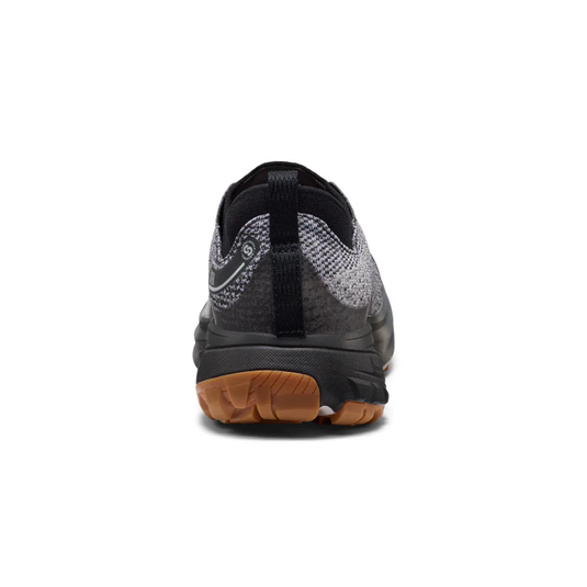 Black athletic shoe with a brown sole on a white background
