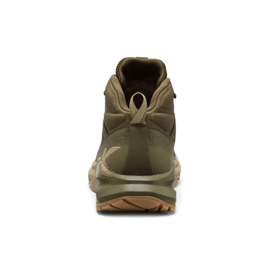Green hiking boot on a white background