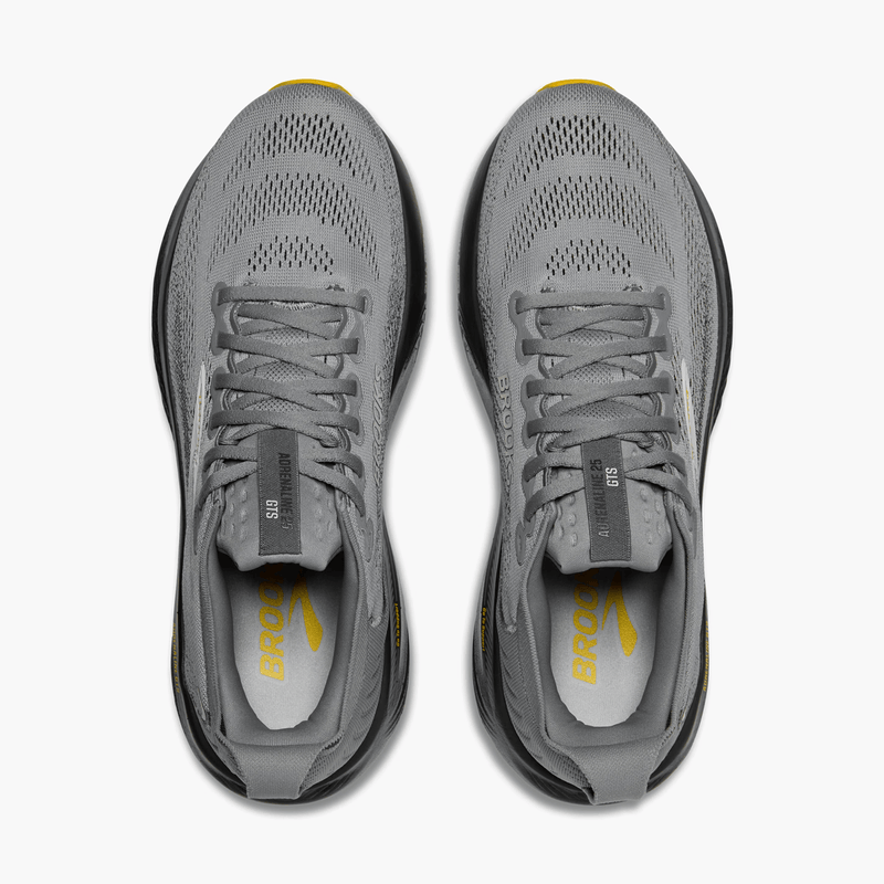 Load image into Gallery viewer, Gray running shoes with visible brand logo on a white background
