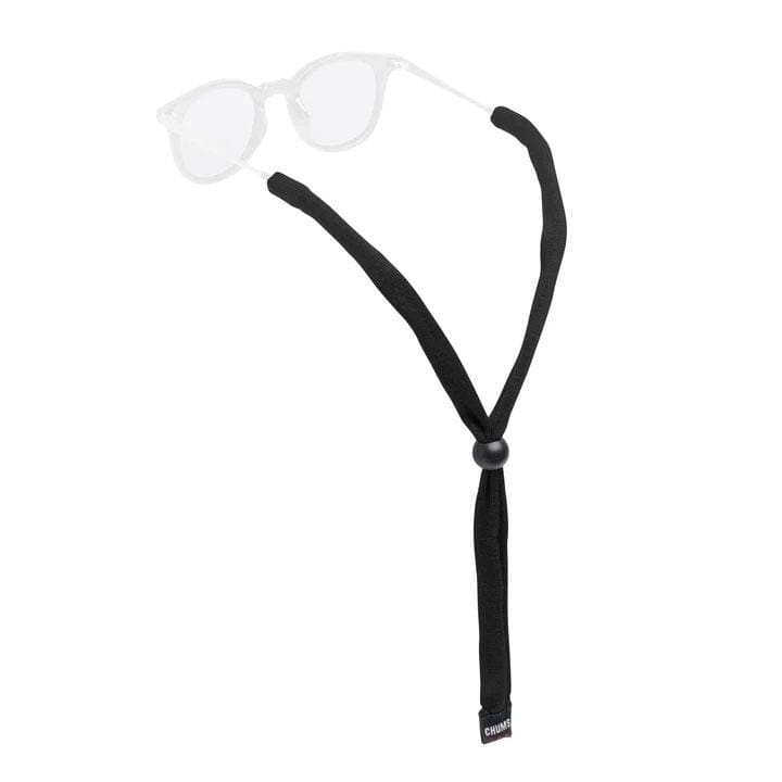 Load image into Gallery viewer, A black kids-sized cotton eyewear retainer with an adjustable bead, displayed with a pair of glasses.
