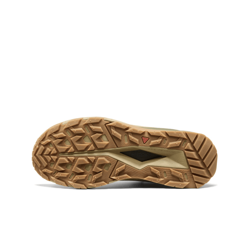 Load image into Gallery viewer, Close-up of a brown shoe sole with tread pattern on a white background
