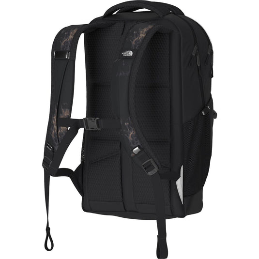 Black backpack with camouflage accents on a white background