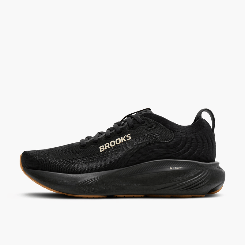Load image into Gallery viewer, Black running shoe with 'Brooks' branding on a white background
