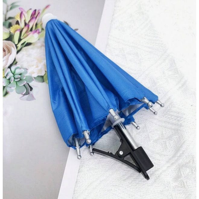Load image into Gallery viewer, Blue umbrella with metal shaft on a white surface
